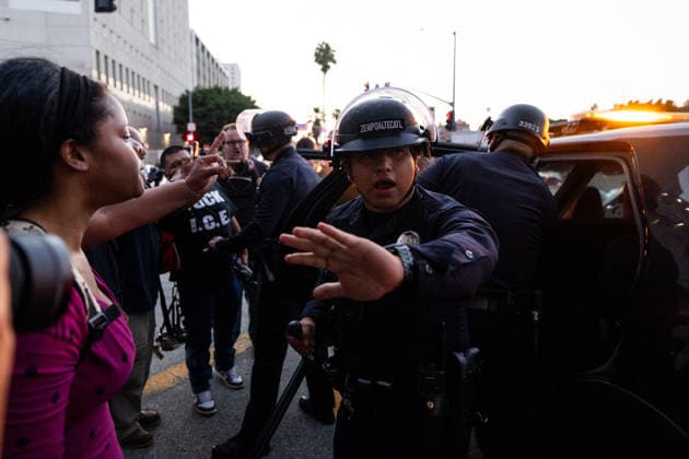 LOS ANGELES, CA - JUNE 06: Anti-ICE demonstrators clash with police officers outside a federal detention center on June 6, 2026 in Los Angeles, California.  Copyright: xVCGx 111646651199