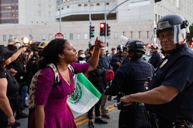 LOS ANGELES, CA - JUNE 06: Anti-ICE demonstrators clash with police officers outside a federal detention center on June 6, 2026 in Los Angeles, California.  Copyright: xVCGx 111646651200
