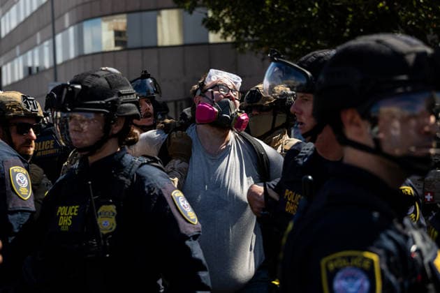 LOS ANGELES, CA - JUNE 06: A protester is arrested by police officers outside a federal detention center during an anti-ICE protest on June 6, 2026 in Los Angeles, California.  Copyright: xVCGx 111646651192
