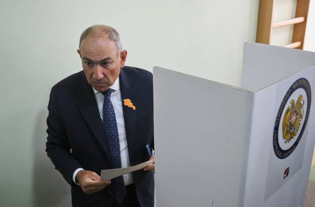 Armenia Parliamentary Election 9184609 07.06.2026 Civil Contract party leader and Armenian Prime Minister Nikol Pashinyan leaves a voting booth before casting his ballot at a polling station during the Armenian parliamentary election in Yerevan, Armenia. Yuri Kochetkov Sputnik Yerevan Armenia  Copyright: xYurixKochetkovx