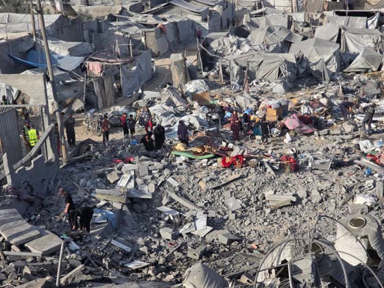 Palestinians Inspect Destruction After Strike on Displacement Area Palestinians inspect the destruction caused by an Israeli airstrike that targeted tents and shelters for displaced people in the Mawasi area of Khan Younis, southern Gaza Strip, on June 7, 2026. Debris and personal belongings were scattered across the sandy area as residents searched through the wreckage of their damaged shelters. Photo by Tariq Mohammad APA Images Khan Yunis Gaza Strip Palestinian Territory 070626_Khan_Yunis_TM_00(24) Copyright: xapaimagesxTariqxMohammad xapaimagesx