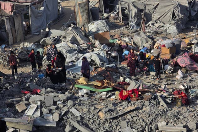 Palestinians Inspect Destruction After Strike on Displacement Area Palestinians inspect the destruction caused by an Israeli airstrike that targeted tents and shelters for displaced people in the Mawasi area of Khan Younis, southern Gaza Strip, on June 7, 2026. Debris and personal belongings were scattered across the sandy area as residents searched through the wreckage of their damaged shelters. Photo by Tariq Mohammad APA Images Khan Yunis Gaza Strip Palestinian Territory 070626_Khan_Yunis_TM_00(23) Copyright: xapaimagesxTariqxMohammad xapaimagesx