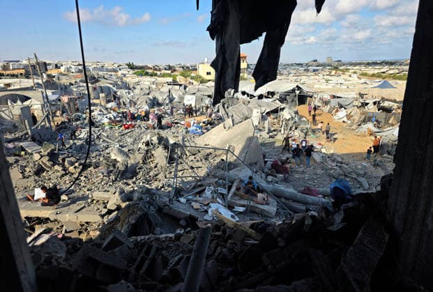 Palestinians Inspect Destruction After Strike on Displacement Area Palestinians inspect the destruction caused by an Israeli airstrike that targeted tents and shelters for displaced people in the Mawasi area of Khan Younis, southern Gaza Strip, on June 7, 2026. Debris and personal belongings were scattered across the sandy area as residents searched through the wreckage of their damaged shelters. Photo by Tariq Mohammad APA Images Khan Yunis Gaza Strip Palestinian Territory 070626_Khan_Yunis_TM_00(31) Copyright: xapaimagesxTariqxMohammad xapaimagesx