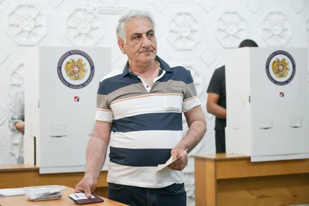 ARMENIA, YEREVAN - JUNE 7, 2026: A man votes in the 2026 Armenian parliamentary election. Alexander Patrin TASS  93505199
