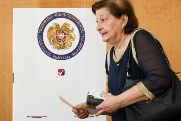 ARMENIA, YEREVAN - JUNE 7, 2026: A woman votes in the 2026 Armenian parliamentary election. Alexander Patrin TASS  93505202