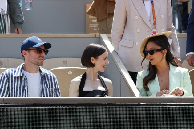 2026 French Open - Lily Collins In The Stands Charlie McDowell, Lily Collins and Ashley Park in the stands during Day Fifteen of the 2026 French Open on June 07, 2026 in Paris, France. Photo by Nasser Berzane ABACAPRESS.COM Paris France  Copyright: xBerzanexNasser ABACAx