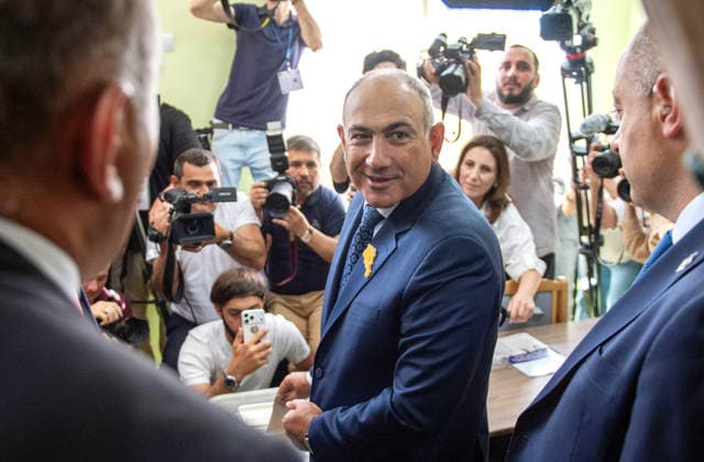 (260607) -- YEREVAN, June 7, 2026 -- Armenian Prime Minister Nikol Pashinyan casts his ballot at a polling station in Yerevan, Armenia, June 7, 2026. Voting began on Sunday in Armenia s parliamentary elections, with more than 2.48 million registered voters eligible to cast ballots at 2,005 polling stations across the country. Polling stations opened at 8:00 a.m. local time (0400 GMT) and will close at 8:00 p.m. local time. ) ARMENIA-YEREVAN-PARLIAMENTARY ELECTIONS-VOTING ChenxJunfeng 