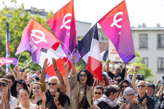 Activists at the first presidential campaign rally for Jean Luc Mélenchon LFI on Place Victor Hugo in Saint Denis Pierrefitte, France, on June 7, 2026 France votes in a presidential election scheduled for April 2027 Emmanuel Forgeron Agence1827 Bestimage Rally to launch the campaign of French leftist party La France Insoumise LFI presidential candidate Jean Luc Melenchon on Place Victor Hugo in Saint Denis, a northern Paris suburb, France, on June 7, 2026 France votes in a presidential election scheduled for April 2027 Saint Denis France  Copyright: xEmmanuelxForgeronx xBestimagexEmmanuelxForgeronx xBestimagex