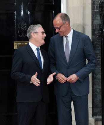 British Prime Minister Keir Starmer greets German Chancellor Friedrich Merz at No.10 Downing Street in London on Sunday June 07, 2025. Starmer, Merz,Macron and Zelensky are meeting together to discuss peace in Ukraine.  LON2026060722 HUGOxPHILPOTT