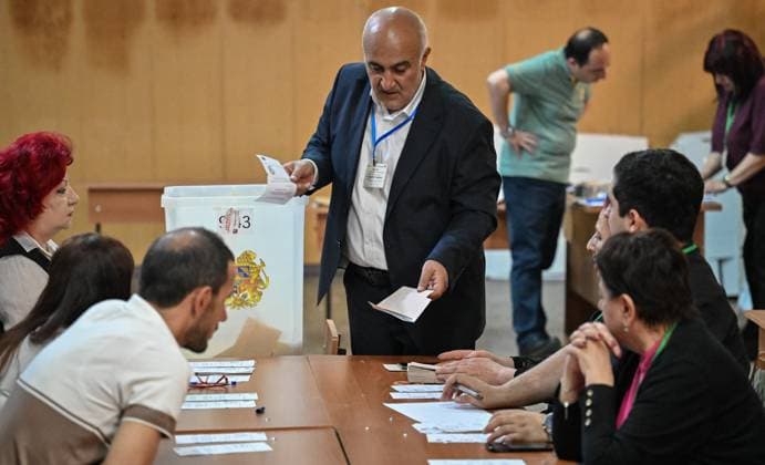 Armenia Parliamentary Election 9185187 07.06.2026 Members of a local electoral commission count ballots at a polling station during the Armenian parliamentary election in Yerevan, Armenia. Yuri Kochetkov Sputnik Yerevan Armenia  Copyright: xYurixKochetkovx