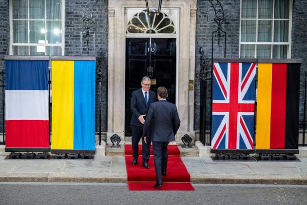 June 7, 2026, London, London, UK: LONDON, UK. Keir Starmer greets President of France. President of Ukraine Volodymyr Zelenskyy arrives in Downing Street for talks with Prime Minister Sir Keir Starmer alongside President of France Emmanuel Macron and Chancellor of Germany Friedrich Merz. The talks are to discuss ongoing European support and solidarity for Ukraine. London UK  - ZUMAl94_ 20260607_zaf_l94_013 Copyright: xStephenxChungx