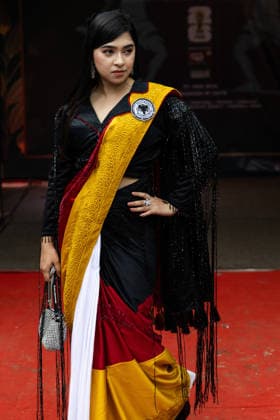 Street Fashion show ahead of the FIFA World cup in Dhaka - 07 Jun 2026 A model seen wearing a dress inspired by the colors and design of the Germany national Football Team during the street Fashion show ahead of the FIFA World cup. Dhaka Bangladesh Copyright: xSazzadxHossainx xSOPAxImagesx Sazzad_FIFA Street Fashion Show Graffiti_FIFA worldcup (15)