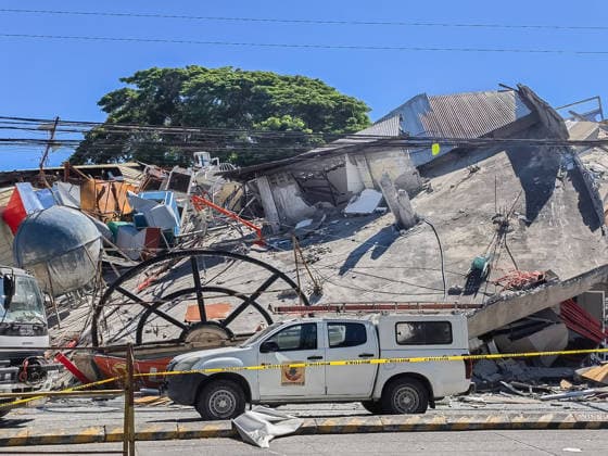 (260608) -- GENERAL SANTOS CITY, June 8, 2026 -- This photo taken on June 8, 2026 shows a damaged building after a 7.8 magnitude earthquake, in General Santos City, the Philippines. Fifteen people were reported dead and at least 134 others injured after a magnitude 7.8 earthquake struck Sarangani province in the southern Philippines Monday morning, authorities said. (SpotNews) PHILIPPINES-GENERAL SANTOS CITY-EARTHQUAKE-AFTERMATH ROUELLExUMALI 
