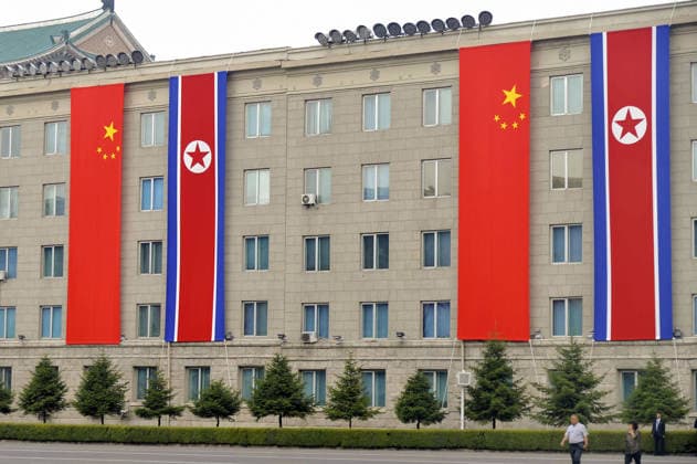 Chinese President Xi in Pyongyang Chinese and North Korean flags hang on the North Korean Foreign Ministry building in Pyongyang on June 8, 2026, as Chinese President Xi Jinping visits North Korea for the first time in seven years for a meeting with North Korean leader Kim Jong Un.  A14AA0005618022P