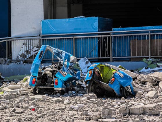 (260608) -- GENERAL SANTOS CITY, June 8, 2026 -- This photo taken on June 8, 2026 shows a damaged vehicle after a 7.8 magnitude earthquake, in General Santos City, the Philippines. Fifteen people were reported dead and at least 134 others injured after a magnitude 7.8 earthquake struck Sarangani province in the southern Philippines Monday morning, authorities said. (SpotNews) PHILIPPINES-GENERAL SANTOS CITY-EARTHQUAKE-AFTERMATH ROUELLExUMALI 