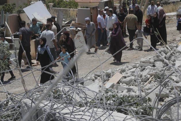 Israeli Forces Demolish Palestinian Home and Workshop Near Hebron Israeli bulldozers demolish the two-story home of Palestinian resident Nayef Abu Sneineh and a carpentry workshop in the Khirbet Qalqas area south of Hebron in the occupied West Bank, on June 8, 2026, as Palestinians inspect the rubble and damage at the site. Photo by Mamoun Wazwaz apaimages Hebron West Bank Palestinian Territory 080626_Hebron_MW_01(31) Copyright: xapaimagesxMamounxWazwazx xapaimagesx