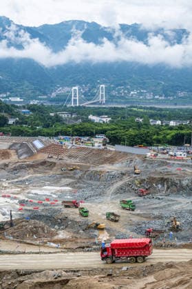 (260608) -- YICHANG, June 8, 2026 -- This photo taken on June 8, 2026 shows the construction site in an early-phase excavation zone of the Three Gorges new waterway project in Yichang, central China s Hubei Province. China on Monday began construction of a mega waterway project, including what is expected to become the world s largest inland ship lock, in response to the rising shipping demand along the Yangtze, the world s third-longest river. It is the first major project to break ground during China s 15th Five-Year Plan period (2026-2030), a critical stage in the country s efforts to advance toward its goal of basically realizing socialist modernization by 2035. ) CHINA-HUBEI-YICHANG-THREE GORGES-NEW WATERWAY PROJECT (CN) WuxZhizun 
