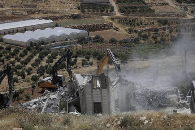 Israeli army demolishes Palestinian home in West Bank, leaving 5 homeless HEBRON, WEST BANK, PALESTINE - JUNE 08: Israeli army heavy machinery demolishes a 2-story Palestinian house, built on a 500-square-meter area and belonging to Nayif Abu Sneineh, in Qalqas village, south of the West Bank city of Hebron, Palestine on June 08, 2026. The demolition leaves five family members homeless. Wisam Hashlamoun Anadolu Hebron West Bank. Editorial use only. Please get in touch for any other usage.  Copyright: x2026xAnadoluxWisamxHashlamounx