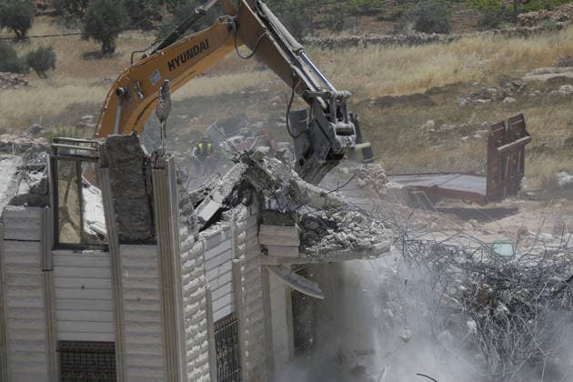Israeli army demolishes Palestinian home in West Bank, leaving 5 homeless HEBRON, WEST BANK, PALESTINE - JUNE 08: Israeli army heavy machinery demolishes a 2-story Palestinian house, built on a 500-square-meter area and belonging to Nayif Abu Sneineh, in Qalqas village, south of the West Bank city of Hebron, Palestine on June 08, 2026. The demolition leaves five family members homeless. Wisam Hashlamoun Anadolu Hebron West Bank. Editorial use only. Please get in touch for any other usage.  Copyright: x2026xAnadoluxWisamxHashlamounx