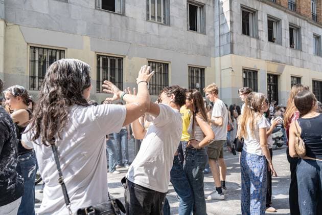 IPA85483577 - Milan, 8 6 26, Liceo Parini, last day of school, boys celebrate with foam, flour and water guns and smoke bombs.  Copyright: xGiuliaxSciaccax xGiuliaxSciaccax 85483577