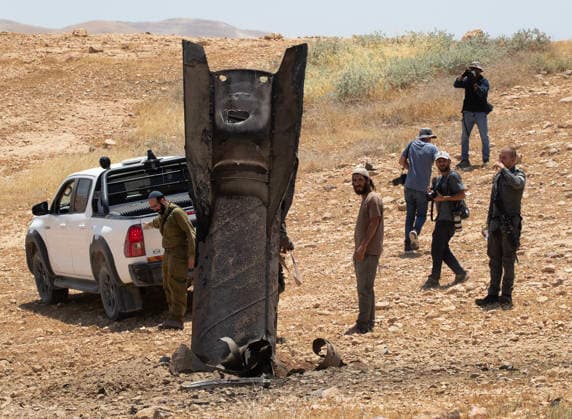 An Iranian ballistic missile sticks out from the desert landscape in the area near Jericho, in the West Bank on Monday, June 8, 2026 after it was intercepted by Israel and fell to the desert. Iran fired barrages of missiles and Israel carried out military strikes on both Beirut and Iran. Both Iran and Israel have signaled they would wind down the military escalation that shattered the two month ceasefire.  ISR20260608005 JimxHollander