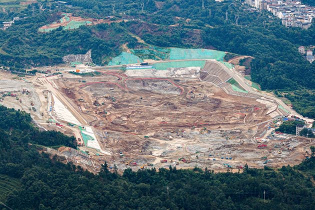 (260608) -- YICHANG, June 8, 2026 -- An aerial drone photo taken on June 8, 2026 shows the construction site of a new ship lock and its approach channels of the Three Gorges new waterway project in Yichang, central China s Hubei Province. China on Monday began construction of a mega waterway project, including what is expected to become the world s largest inland ship lock, in response to the rising shipping demand along the Yangtze, the world s third-longest river. The 77.2-billion-yuan (about 11.3 billion U.S. dollars) project will add a five-tier, dual-track ship lock north of the existing lock at the Three Gorges Dam, the world s largest water conservancy project, and upgrade navigation facilities at a smaller downstream dam. The 