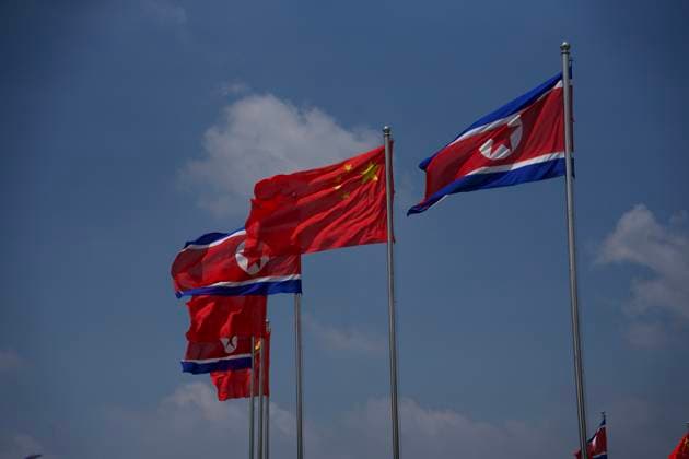 PYONGYANG, NORTH KOREA - JUNE 08: The national flags of North Korea and China are displayed on a street on June 8, 2026 in Pyongyang, North Korea. The Democratic People s Republic of Korea (DPRK) held a grand welcome ceremony for Xi Jinping, general secretary of the Communist Party of China Central Committee and Chinese president, who arrived in Pyongyang on Monday for a state visit.  Copyright: xVCGx 111646932194