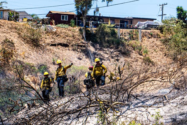 June 8, 2026, Oceanside, California, USA: Fire crews battle a brushfire off Benet Rd. in Oceanside, California, on June 08, 2026. The Airport Fire temporarily placed evacuations order for nearby residents and businesses. Oceanside USA - ZUMAg219 20260608_znp_g219_003 Copyright: xJakexLeexGreenx