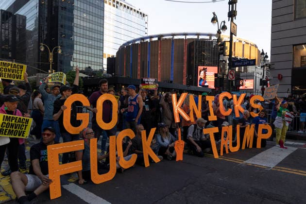 June 8, 2026, New York, New York, USA: Protesters hold letters that read GO KNICKS FUCK TRUMP and signs that read IMPEACH CONVICT REMOVE outside Madison Square Garden as fans enter the stadium for game 3 of the NBA finals. Security is high in Midtown Manhattan with street closures, portable fences, barricades and heavy police presence for President Trump s attendance at the basketball game. New York USA - ZUMAr174 20260608_znp_r174_028 Copyright: xGinaxMxRandazzox