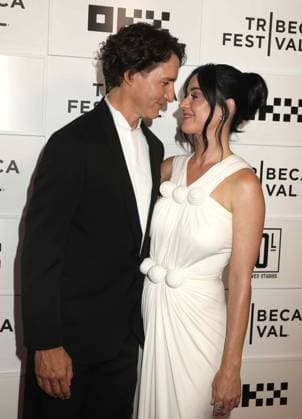 June 8, 2026, New York, New York, USA: Former Prime Minister of Canada JUSTIN TRUDEAU and singer KATY PERRY seen at the New York Premiere of Katy Perry - The Lifetimes Tour - Live From Paris during the 2026 Tribeca Film Festival at the BMCC Tribeca Performing Arts Center OKX Theater. New York USA  - ZUMAk03_ 20260608_zaf_k03_022 Copyright: xNancyxKaszermanx