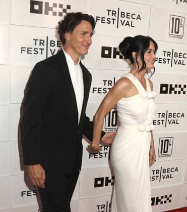 June 8, 2026, New York, New York, USA: Former Prime Minister of Canada JUSTIN TRUDEAU and singer KATY PERRY seen at the New York Premiere of Katy Perry - The Lifetimes Tour - Live From Paris during the 2026 Tribeca Film Festival at the BMCC Tribeca Performing Arts Center OKX Theater. New York USA  - ZUMAk03_ 20260608_zaf_k03_027 Copyright: xNancyxKaszermanx