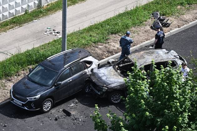 Russia Car Blast 9186050 09.06.2026 Law enforcement officers work at the site of a BMW X3 explosion near a residential building on Koldunovo Street in Balashikha, outside Moscow, Russia. The driver has sustained multiple injuries and died at the site. Kristina Solovyova Sputnik Balashikha Moscow region Russia  Copyright: xKristinaxSolovyovax