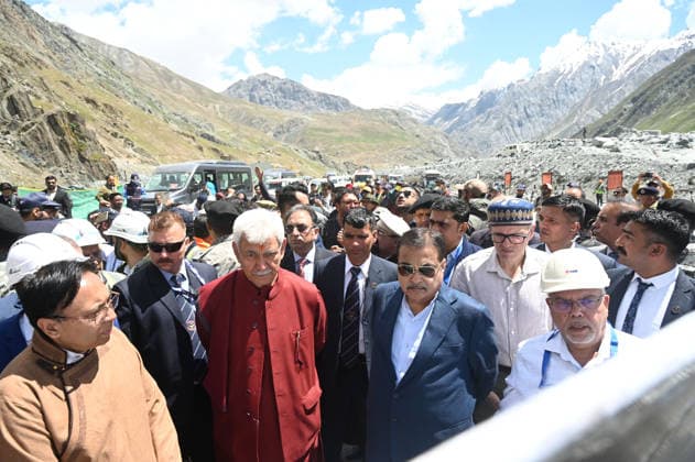 DRASS, INDIA - JUNE 9: Union Minister of Road Transport and Highways, Nitin Gadkari, with Jammu and Kashmir Lieutenant Governor Manoj Sinha and Jammu and Kashmir Chief Minister Omar Abdullah at the historic breakthrough ceremony of the Zojila Tunnel at Meenamarg on June 9, 2026 in Drass, India. Build at the cost of Rs 6000 Cr. the 13.15 KM tunnel is now the world s longest single-tube, bi-directional road tunnel at an elevation exceeding 11,500 feet. The historic breakthrough brings a decades-old national security dream closer to reality. For generations, the treacherous Zojila Pass on National Highway 1 (NH-1) has functioned as a severe logistical bottleneck, shutting down completely for three to four months during peak winter due to heav