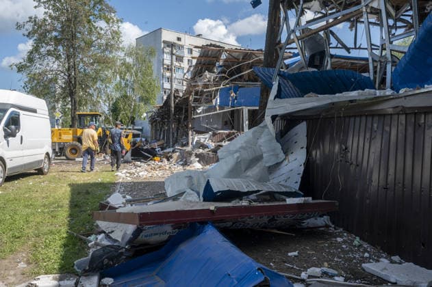 Aftermath of Russian attack on Ukraine s Chuhuiv CHUHUIV, KHARKIV REGION, UKRAINE - JUNE 9: Local residents clean the damage caused by the Russian missile strike on Chuhuiv, Kharkiv Region, Ukraine on June 9, 2026.Three people were killed in the missile attack on Chuhuiv: two men, aged 56 and 70, and a 22-year-old pregnant woman. Medical personnel provided assistance to two women, aged 71 and 65, and a 70-year-old man who suffered acute stress reactions. Two buildings, stores, garages, and two cars were damaged. Serhii Masin Anadolu Kharkiv Ukraine. Editorial use only. Please get in touch for any other usage.  Copyright: x2026xAnadoluxSerhiixMasinx