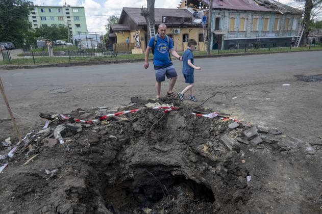 Aftermath of Russian attack on Ukraine s Chuhuiv CHUHUIV, KHARKIV REGION, UKRAINE - JUNE 9: Local residents clean the damage caused by the Russian missile strike on Chuhuiv, Kharkiv Region, Ukraine on June 9, 2026.Three people were killed in the missile attack on Chuhuiv: two men, aged 56 and 70, and a 22-year-old pregnant woman. Medical personnel provided assistance to two women, aged 71 and 65, and a 70-year-old man who suffered acute stress reactions. Two buildings, stores, garages, and two cars were damaged. Serhii Masin Anadolu Kharkiv Ukraine. Editorial use only. Please get in touch for any other usage.  Copyright: x2026xAnadoluxSerhiixMasinx