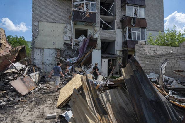 Aftermath of Russian attack on Ukraine s Chuhuiv CHUHUIV, KHARKIV REGION, UKRAINE - JUNE 9: Local residents clean the damage caused by the Russian missile strike on Chuhuiv, Kharkiv Region, Ukraine on June 9, 2026.Three people were killed in the missile attack on Chuhuiv: two men, aged 56 and 70, and a 22-year-old pregnant woman. Medical personnel provided assistance to two women, aged 71 and 65, and a 70-year-old man who suffered acute stress reactions. Two buildings, stores, garages, and two cars were damaged. Serhii Masin Anadolu Kharkiv Ukraine. Editorial use only. Please get in touch for any other usage.  Copyright: x2026xAnadoluxSerhiixMasinx