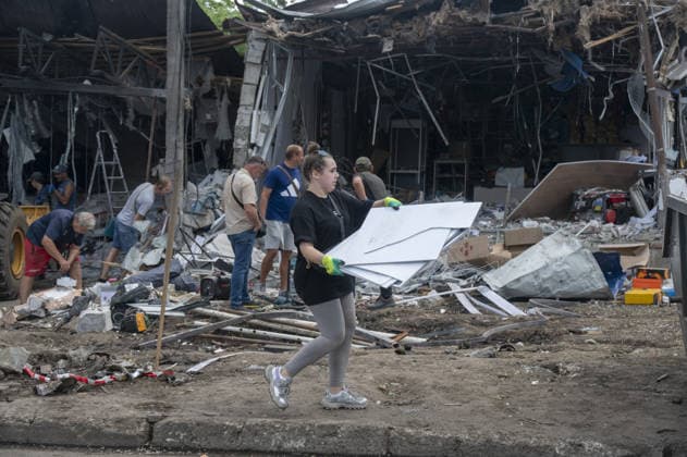 Aftermath of Russian attack on Ukraine s Chuhuiv CHUHUIV, KHARKIV REGION, UKRAINE - JUNE 9: Local residents clean the damage caused by the Russian missile strike on Chuhuiv, Kharkiv Region, Ukraine on June 9, 2026.Three people were killed in the missile attack on Chuhuiv: two men, aged 56 and 70, and a 22-year-old pregnant woman. Medical personnel provided assistance to two women, aged 71 and 65, and a 70-year-old man who suffered acute stress reactions. Two buildings, stores, garages, and two cars were damaged. Serhii Masin Anadolu Kharkiv Ukraine. Editorial use only. Please get in touch for any other usage.  Copyright: x2026xAnadoluxSerhiixMasinx