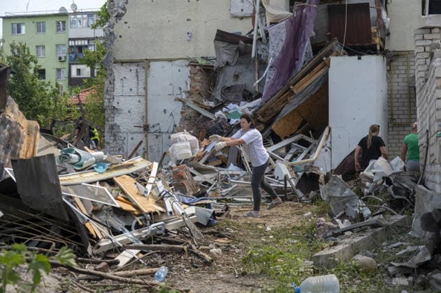 Aftermath of Russian attack on Ukraine s Chuhuiv CHUHUIV, KHARKIV REGION, UKRAINE - JUNE 9: Local residents clean the damage caused by the Russian missile strike on Chuhuiv, Kharkiv Region, Ukraine on June 9, 2026.Three people were killed in the missile attack on Chuhuiv: two men, aged 56 and 70, and a 22-year-old pregnant woman. Medical personnel provided assistance to two women, aged 71 and 65, and a 70-year-old man who suffered acute stress reactions. Two buildings, stores, garages, and two cars were damaged. Serhii Masin Anadolu Kharkiv Ukraine. Editorial use only. Please get in touch for any other usage.  Copyright: x2026xAnadoluxSerhiixMasinx