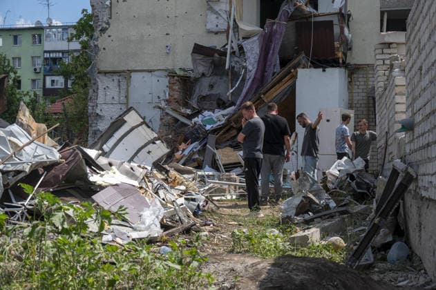 Aftermath of Russian attack on Ukraine s Chuhuiv CHUHUIV, KHARKIV REGION, UKRAINE - JUNE 9: Local residents clean the damage caused by the Russian missile strike on Chuhuiv, Kharkiv Region, Ukraine on June 9, 2026.Three people were killed in the missile attack on Chuhuiv: two men, aged 56 and 70, and a 22-year-old pregnant woman. Medical personnel provided assistance to two women, aged 71 and 65, and a 70-year-old man who suffered acute stress reactions. Two buildings, stores, garages, and two cars were damaged. Serhii Masin Anadolu Kharkiv Ukraine. Editorial use only. Please get in touch for any other usage.  Copyright: x2026xAnadoluxSerhiixMasinx