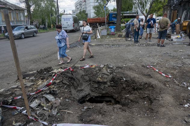 Aftermath of Russian attack on Ukraine s Chuhuiv CHUHUIV, KHARKIV REGION, UKRAINE - JUNE 9: Local residents clean the damage caused by the Russian missile strike on Chuhuiv, Kharkiv Region, Ukraine on June 9, 2026.Three people were killed in the missile attack on Chuhuiv: two men, aged 56 and 70, and a 22-year-old pregnant woman. Medical personnel provided assistance to two women, aged 71 and 65, and a 70-year-old man who suffered acute stress reactions. Two buildings, stores, garages, and two cars were damaged. Serhii Masin Anadolu Kharkiv Ukraine. Editorial use only. Please get in touch for any other usage.  Copyright: x2026xAnadoluxSerhiixMasinx