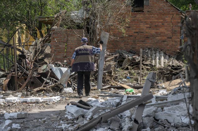 Aftermath of Russian attack on Ukraine s Chuhuiv CHUHUIV, KHARKIV REGION, UKRAINE - JUNE 9: Local residents clean the damage caused by the Russian missile strike on Chuhuiv, Kharkiv Region, Ukraine on June 9, 2026.Three people were killed in the missile attack on Chuhuiv: two men, aged 56 and 70, and a 22-year-old pregnant woman. Medical personnel provided assistance to two women, aged 71 and 65, and a 70-year-old man who suffered acute stress reactions. Two buildings, stores, garages, and two cars were damaged. Serhii Masin Anadolu Kharkiv Ukraine. Editorial use only. Please get in touch for any other usage.  Copyright: x2026xAnadoluxSerhiixMasinx