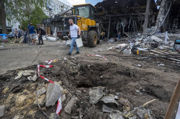 Aftermath of Russian attack on Ukraine s Chuhuiv CHUHUIV, KHARKIV REGION, UKRAINE - JUNE 9: Local residents clean the damage caused by the Russian missile strike on Chuhuiv, Kharkiv Region, Ukraine on June 9, 2026.Three people were killed in the missile attack on Chuhuiv: two men, aged 56 and 70, and a 22-year-old pregnant woman. Medical personnel provided assistance to two women, aged 71 and 65, and a 70-year-old man who suffered acute stress reactions. Two buildings, stores, garages, and two cars were damaged. Serhii Masin Anadolu Kharkiv Ukraine. Editorial use only. Please get in touch for any other usage.  Copyright: x2026xAnadoluxSerhiixMasinx