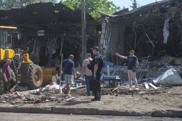 Aftermath of Russian attack on Ukraine s Chuhuiv CHUHUIV, KHARKIV REGION, UKRAINE - JUNE 9: Local residents clean the damage caused by the Russian missile strike on Chuhuiv, Kharkiv Region, Ukraine on June 9, 2026.Three people were killed in the missile attack on Chuhuiv: two men, aged 56 and 70, and a 22-year-old pregnant woman. Medical personnel provided assistance to two women, aged 71 and 65, and a 70-year-old man who suffered acute stress reactions. Two buildings, stores, garages, and two cars were damaged. Serhii Masin Anadolu Kharkiv Ukraine. Editorial use only. Please get in touch for any other usage.  Copyright: x2026xAnadoluxSerhiixMasinx