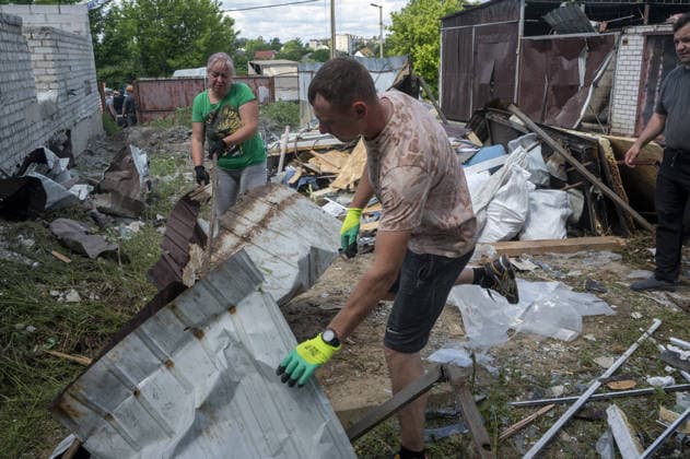 Aftermath of Russian attack on Ukraine s Chuhuiv CHUHUIV, KHARKIV REGION, UKRAINE - JUNE 9: Local residents clean the damage caused by the Russian missile strike on Chuhuiv, Kharkiv Region, Ukraine on June 9, 2026.Three people were killed in the missile attack on Chuhuiv: two men, aged 56 and 70, and a 22-year-old pregnant woman. Medical personnel provided assistance to two women, aged 71 and 65, and a 70-year-old man who suffered acute stress reactions. Two buildings, stores, garages, and two cars were damaged. Serhii Masin Anadolu Kharkiv Ukraine. Editorial use only. Please get in touch for any other usage.  Copyright: x2026xAnadoluxSerhiixMasinx