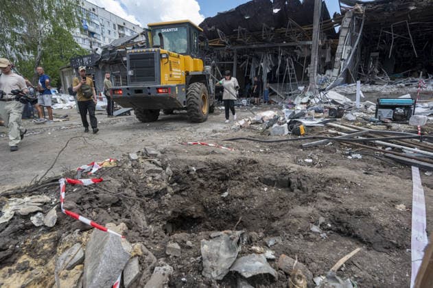 Aftermath of Russian attack on Ukraine s Chuhuiv CHUHUIV, KHARKIV REGION, UKRAINE - JUNE 9: Local residents clean the damage caused by the Russian missile strike on Chuhuiv, Kharkiv Region, Ukraine on June 9, 2026.Three people were killed in the missile attack on Chuhuiv: two men, aged 56 and 70, and a 22-year-old pregnant woman. Medical personnel provided assistance to two women, aged 71 and 65, and a 70-year-old man who suffered acute stress reactions. Two buildings, stores, garages, and two cars were damaged. Serhii Masin Anadolu Kharkiv Ukraine. Editorial use only. Please get in touch for any other usage.  Copyright: x2026xAnadoluxSerhiixMasinx