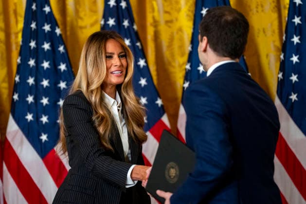 First Lady Melania Trump shakes hands with Director of the White House Office of Science and Technology Policy Michael Kratsios during an event honoring the winners of the Presidential AI Regional Challenge in the East Room of the White House in Washington, DC on Tuesday, June 9, 2026. The challenge recognizes both student and educator teams who designed AI-based solutions for community challenges.  WAP20260609383 BONNIExCASH
