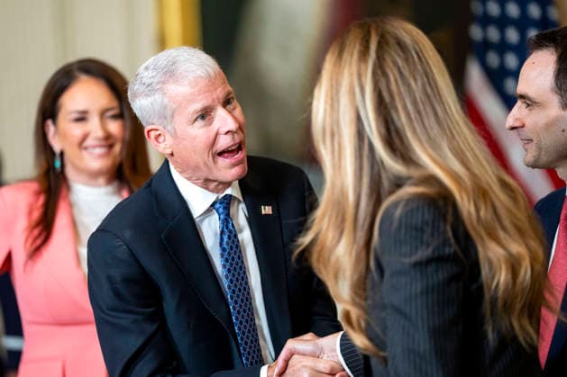First Lady Melania Trump shakes hands with Secretary of Energy Chris Wright during an event honoring the winners of the Presidential AI Regional Challenge in the East Room of the White House in Washington, DC on Tuesday, June 9, 2026. The challenge recognizes both student and educator teams who designed AI-based solutions for community challenges.  WAP20260609393 BONNIExCASH