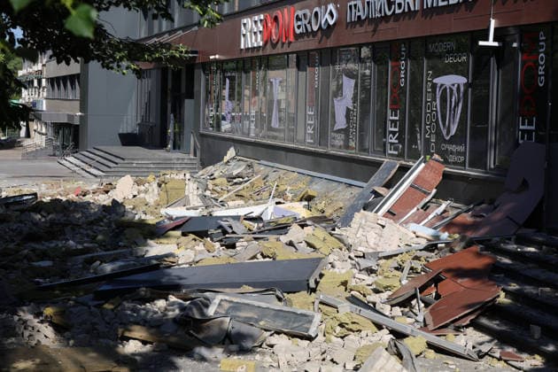 Russian army launches large-scale drone attack on Kharkiv Rubble covers the ground outside a building damaged by a drone strike in one of the districts of Kharkiv, Ukraine, on June 9, 2026. The incident involved a significant drone operation in the city, affecting residential buildings and civilian infrastructure, and resulting in injuries to 15 people, including three children. Kharkiv Ukraine  Copyright: xViacheslavxMadiievskyix originalFilename: ukrinform-russiana260609_npcwR.jpg
