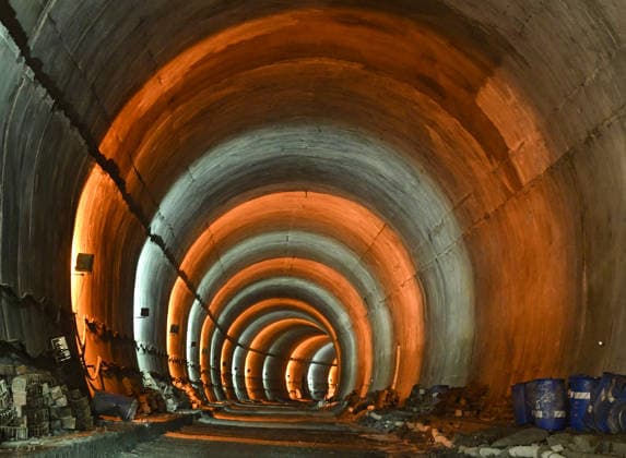 DRASS, INDIA - JUNE 9: Inside view of Zojila Tunnel following its breakthrough ceremony at Meenamarg on June 9, 2026 in Drass, India. Build at the cost of Rs 6000 Cr. the 13.15 KM tunnel is now the world s longest single-tube, bi-directional road tunnel at an elevation exceeding 11,500 feet. The historic breakthrough brings a decades-old national security dream closer to reality. For generations, the treacherous Zojila Pass on National Highway 1 (NH-1) has functioned as a severe logistical bottleneck, shutting down completely for three to four months during peak winter due to heavy avalanches, massive snow accumulation, and sub-zero structural icing.(Photo by Waseem Andrabi Hindustan Times) Union Minister For Road Transport And Highways Nit