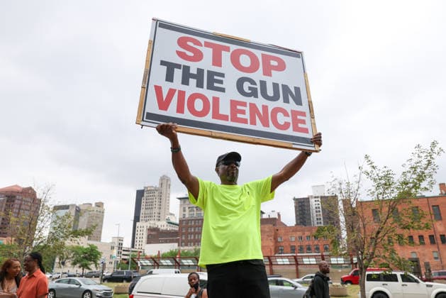 TOLEDO, OH - JUNE 09: Harold Harris holds up a sign saying Stop the Gun Violence during a press conference to address the Old West End Festival mass shooting on June 09, 2026, at One Government Center in Toledo, OH. On June 6, 2026, 12 people were shot while attending the annual Old West End Festival. No fatalities occurred. (Photo by Scott W. Grau Icon Sportswire) EDITORIAL USE ONLY Icon1078365742